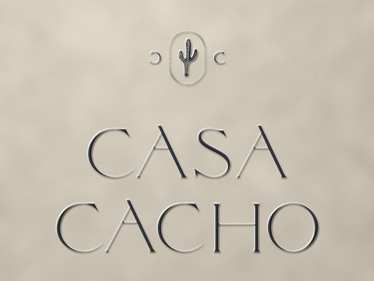 The Casa Cacho mark, embroidered on cotton manta