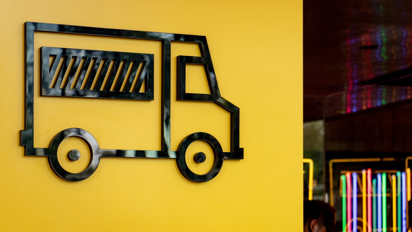 The yellow-truck pictogram, carried through to the space